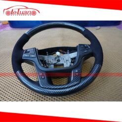 Bọc vô lăng da lộn và ốp giả carbon