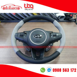 Khâu da vô lăng xe Kia Rondo màu xám phối đen