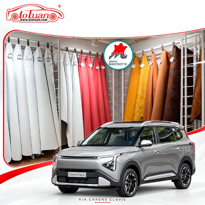 Các tấm da Mastrotto màu trắng, đỏ, vàng và nâu kết hợp với hình Kia Carens Clavis màu bạc.